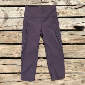 Lululemon size 4 dark purple cropped leggings